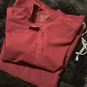 Extra large fig, scrubs, small mark on the pocket